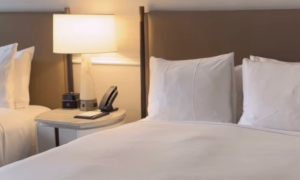A hotel room, styled for arrival